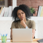 writer frowning at computer